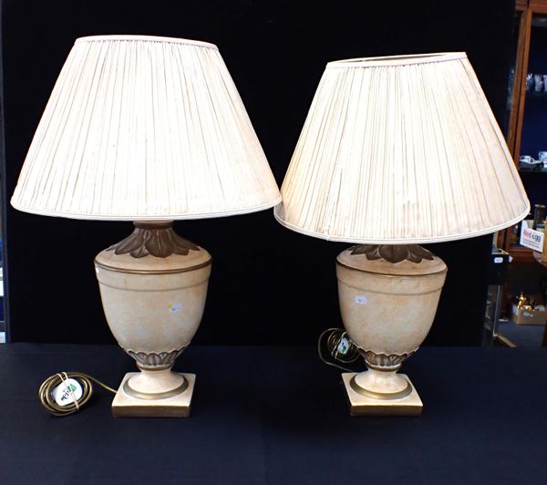 A PAIR OF PAINTED PLASTER URN LAMPS