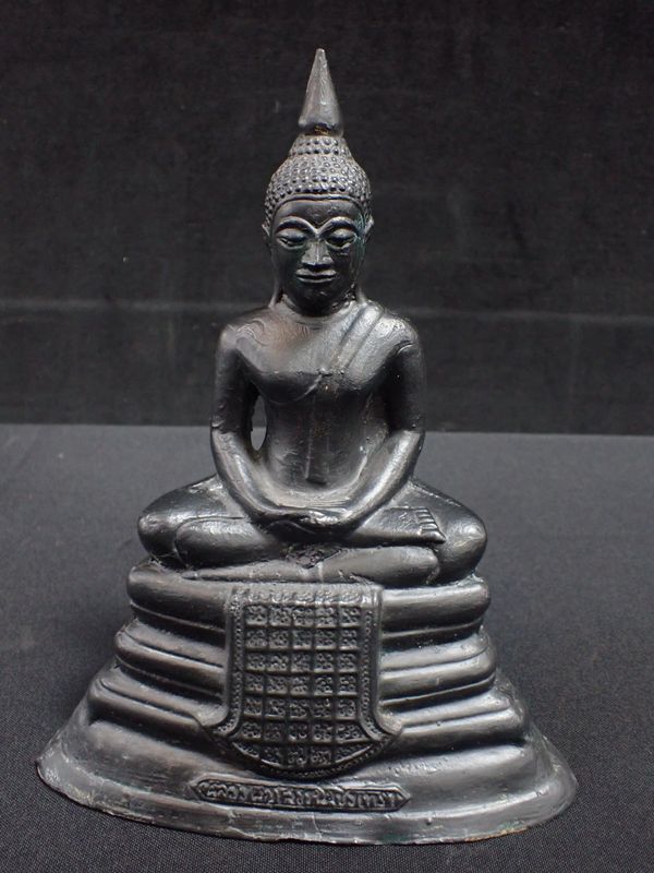 A BRONZE HOUSEHOLD BUDDAH