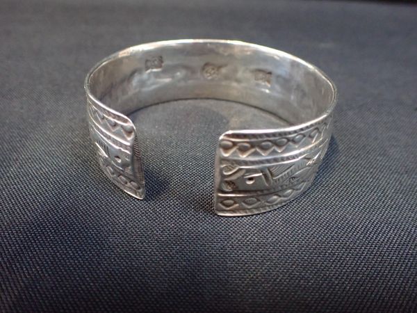 A SILVER BANGLE