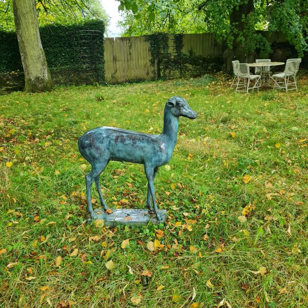 A BRONZE DEER AFTER THE ANTIQUE (HERCULANEUM 79AD)