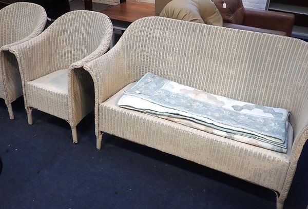 A LLOYD LOOM STYLE THREE PIECE SUITE