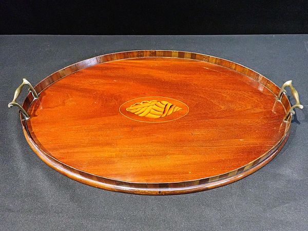 AN EDWARDIAN MAHOGANY OVAL TRAY