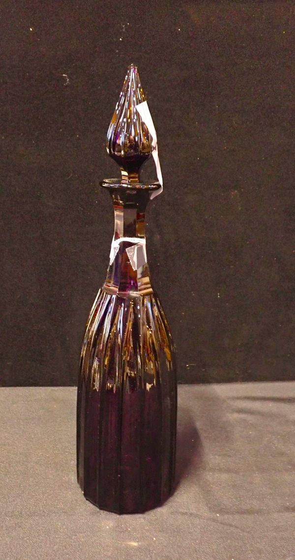 AN AMETHYST GLASS DECANTER