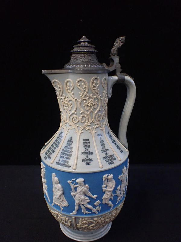 A VILLEROY & BOCH  STONEWARE BEER FLAGON WITH METAL LID