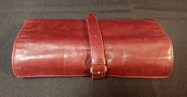 ASPREY: A LEATHER TRAVELLING JEWELLERY ROLL