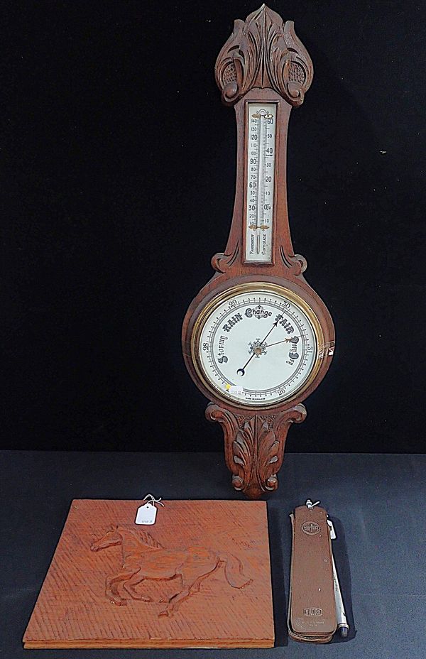 AN OAK-CASED ANEROID BAROMETER