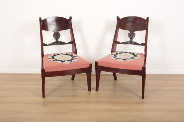 A PAIR OF RUSSIAN FLAME MAHOGANY CHAIRS