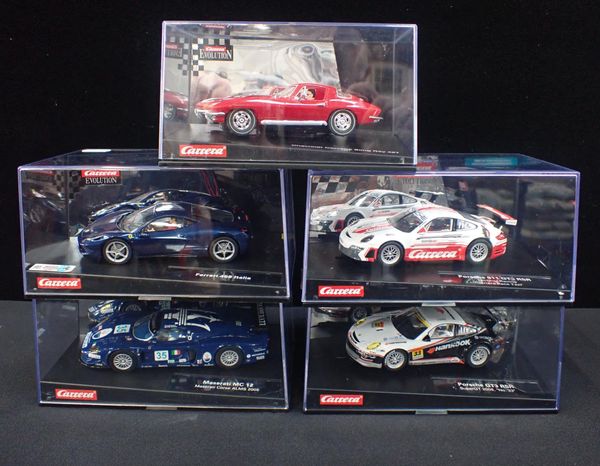 FIVE BOXED 'CARRERA EVOLUTION' SLOT CARS