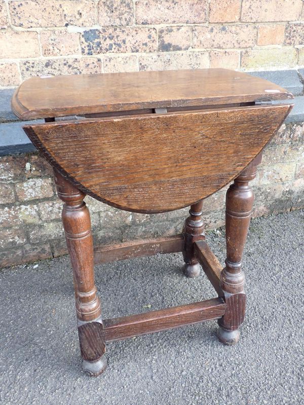 A SMALL CAROLEAN STYLE OAK TABLE