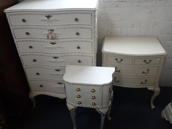 A 'MARIE ANTOINETTE' STYLE WHITE PAINTED TALL CHEST OF DRAWERS