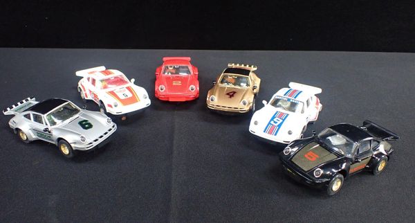 SIX UNBOXED VINTAGE SCALEXTRIC 'PORSCHE  911' RACING CARS