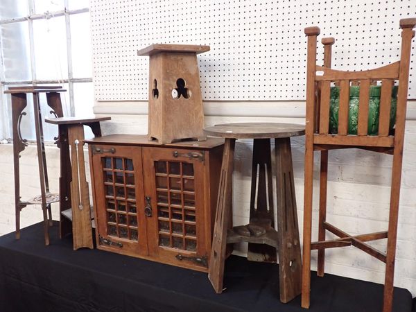 AN ARTS AND CRAFTS OAK OCCASIONAL TABLE