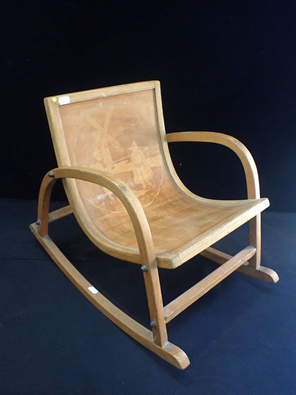 AN EARLY 20th CENTURY CHILDS' BENTWOOD ROCKING CHAIR