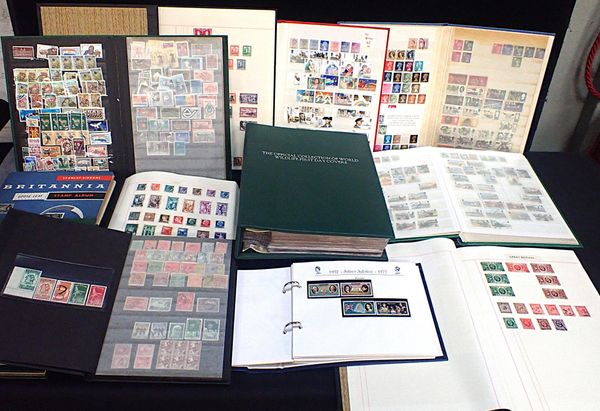 A LARGE COLLECTION OF STAMPS IN FIFTEEN ALBUMS OR STOCKBOOKS