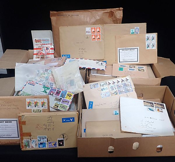 A LARGE COLLECTION OF STAMPS