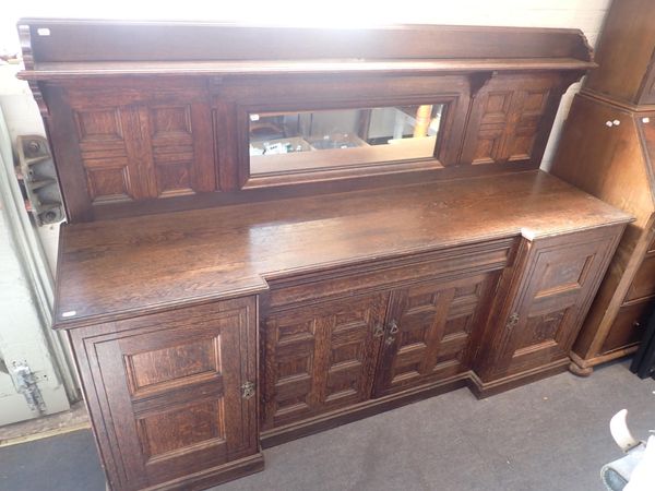 AN OAK SIDEBOARD IN THE STYLE OF BRUCE TALBERT