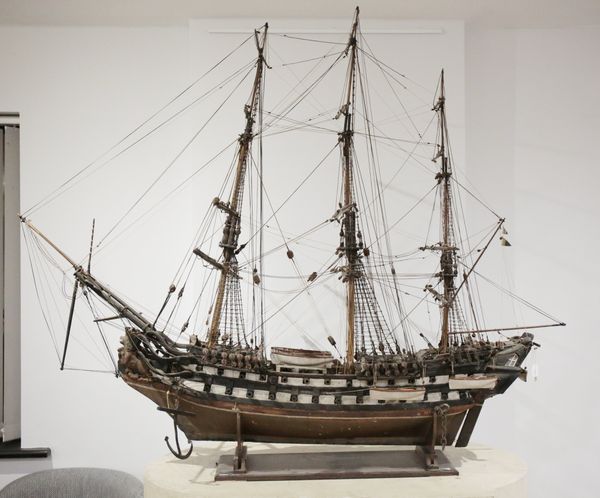 A LARGE VOTIVE MODEL OF THE 18TH CENTURY ARMED SHIP 'ROYAL EXCHANGE'