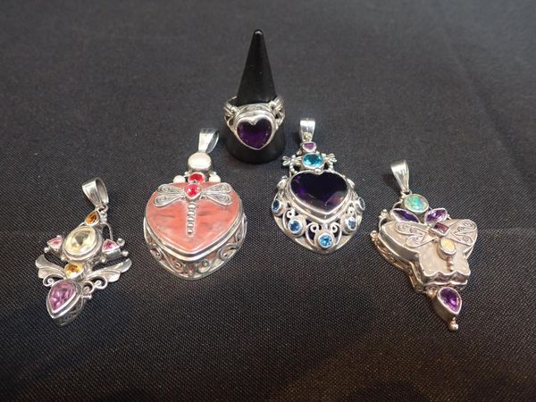 FOUR SHANKARI 'TALISMANS OF POWER' PENDANTS