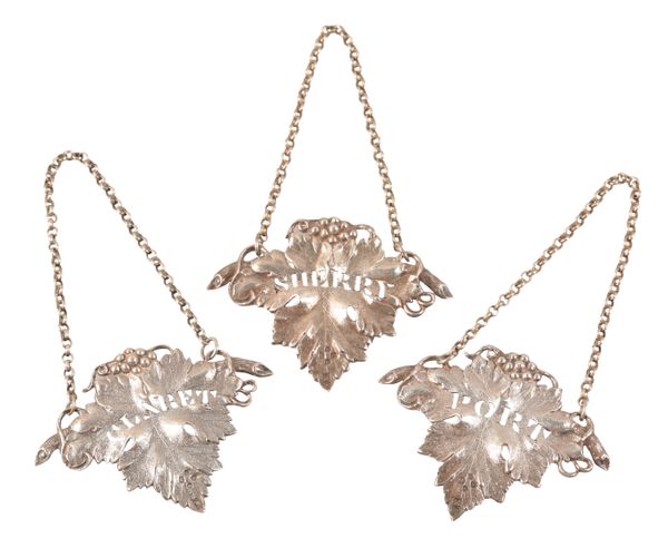 THREE VICTORIAN SILVER DECANTER LABELS
