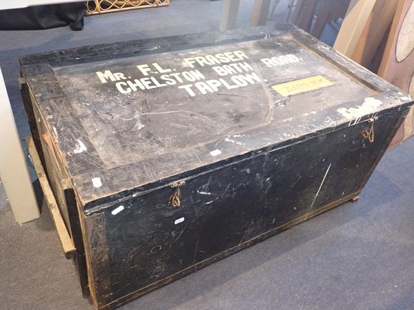 A LARGE METAL-BOUND WOODEN CRATE