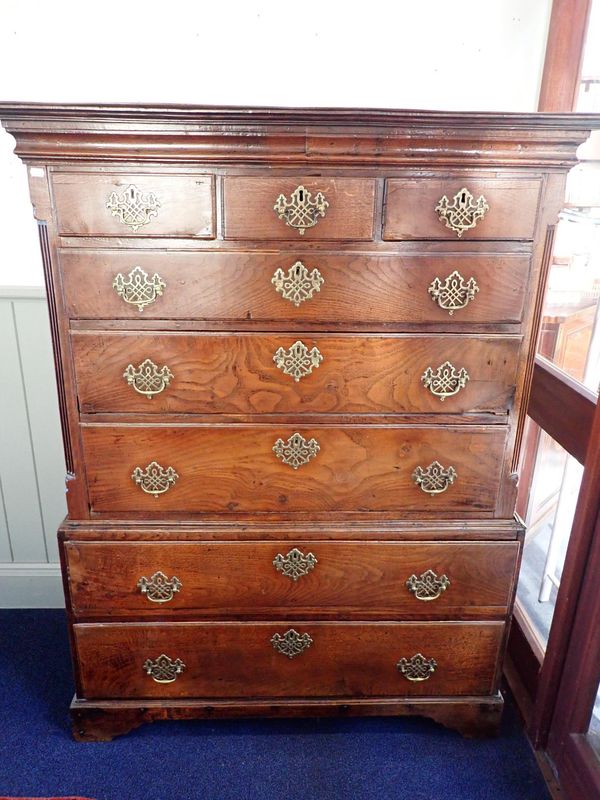 A GEORGE III OAK CHEST ON CHEST