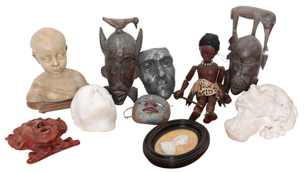 TWO AFRICAN CARVED WOOD TRIBAL MASKS