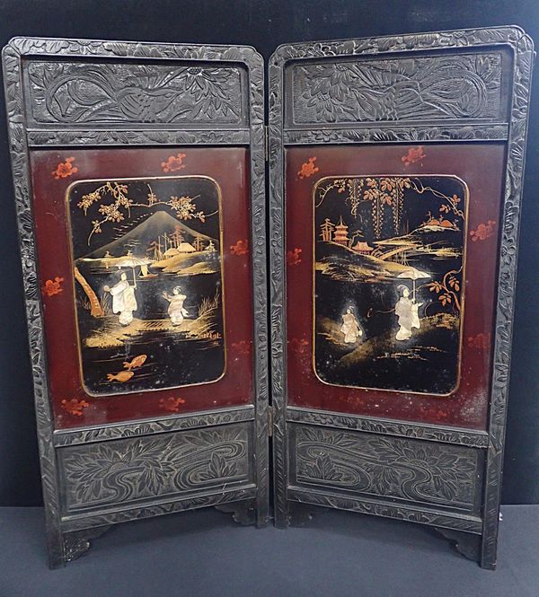A JAPANESE TWO PANEL FOLDING FIRE SCREEN