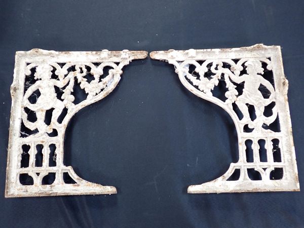 A PAIR OF VICTORIAN CAST IRON SEAT BRACKETS