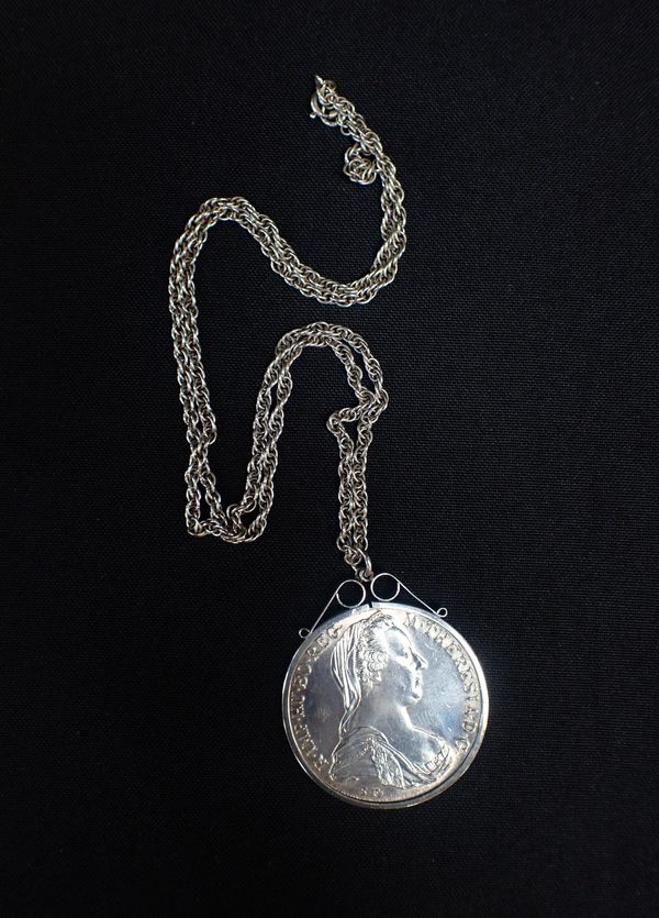 A MARIA THERESA AUSTRIAN THALER COIN PENDANT NECKLACE