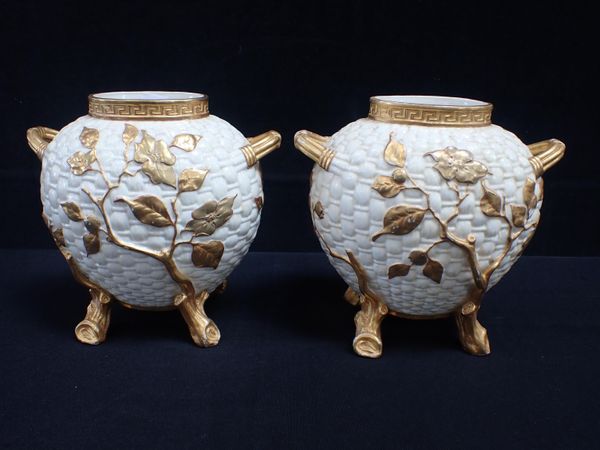 A PAIR OF ROYAL WORCESTER BASKET WEAVE AND GILT VASES