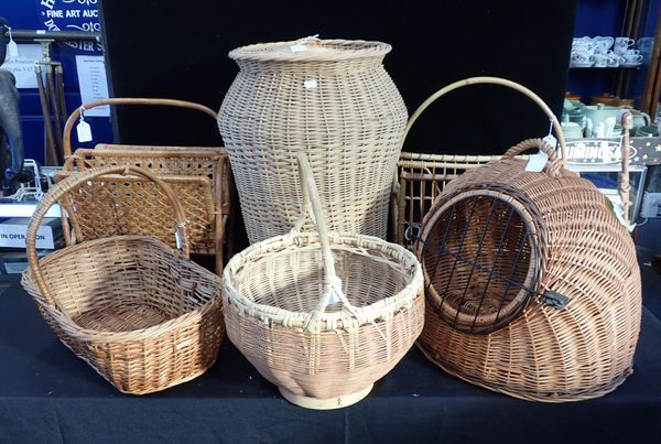 A WICKER LAUNDRY BASKET, A CAT CARRIER