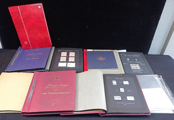 AN OLD TIME STAMP COLLECTION IN VARIOUS ALBUMS