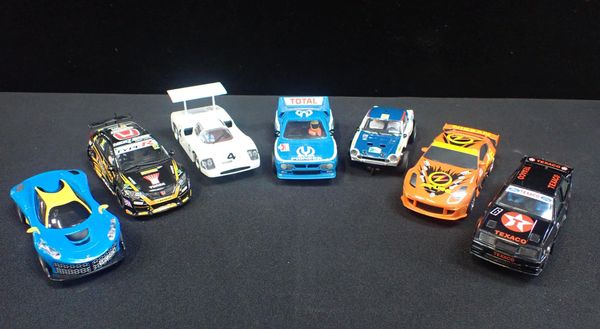 SEVEN UNBOXED SCALEXTRIC RACING CARS