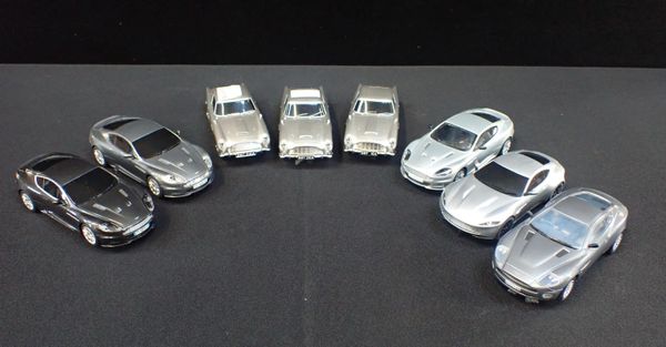 EIGHT UNBOXED SCALEXTRIC 'ASTON MARTIN' CARS