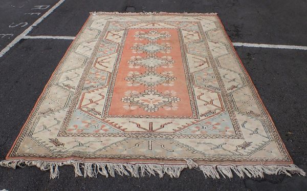 A LARGE TURKISH RUG