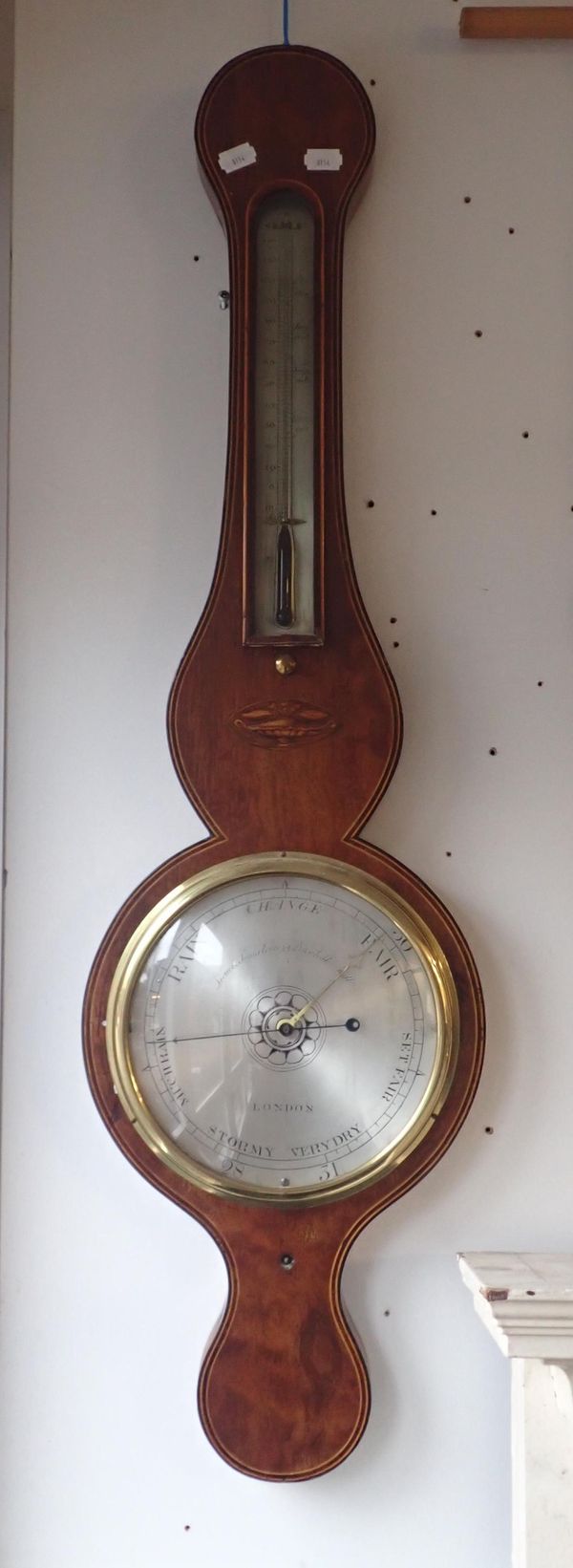 A MAHOGANY CASED WHEEL BAROMETER BY LIONE & SOMALVICO