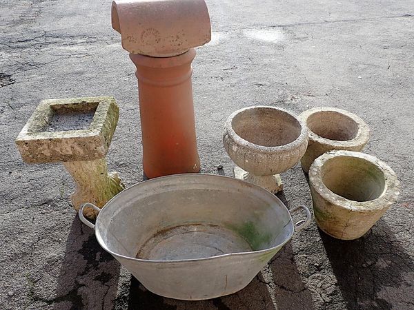 A PAIR OF MODERNIST CONCRETE GARDEN PLANTERS