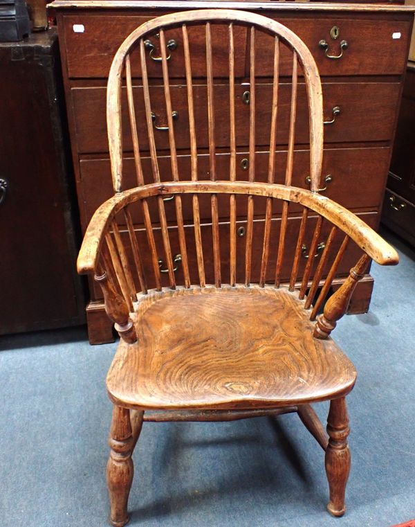 A 19TH CENTURY ELM AND BEECH WINDSOR HOOP-BACK ARMCHAIR