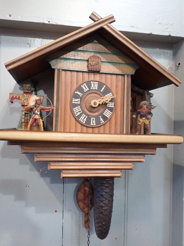 A VINTAGE SCHATZ CUCKOO CLOCK, WITH UNUSUAL 'WILD WEST' THEME