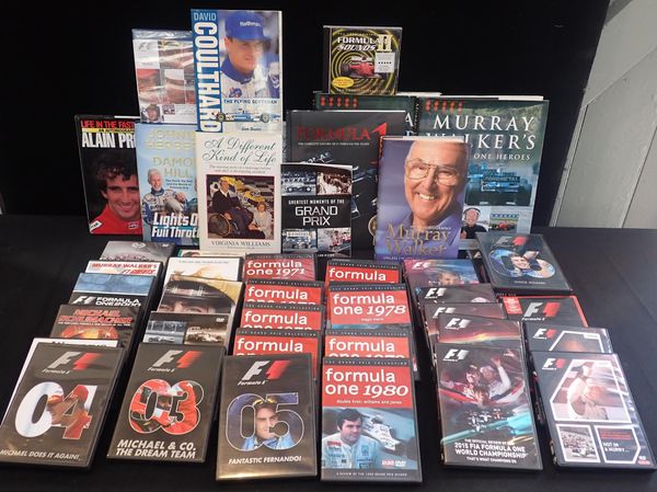 A COLLECTION OF F1 BOOKS AND DVDS