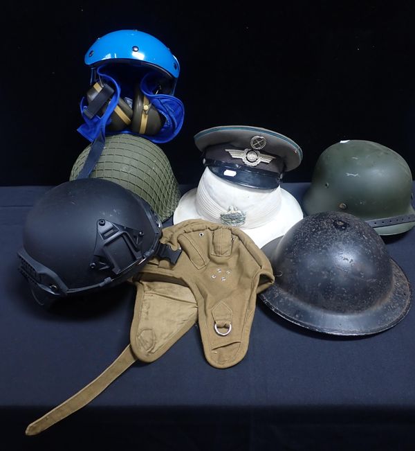 A QUANTITY OF MILITARY HEADWEAR
