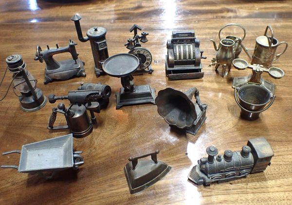 A COLLECTION OF CAST METAL NOVELTY PENCIL SHARPENERS