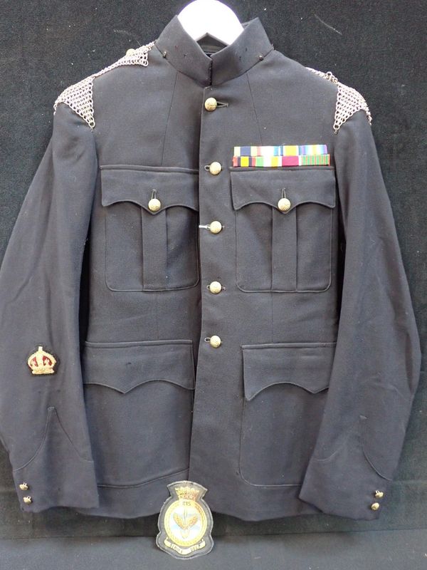 A MILITARY TUNIC, WITH MAIL EPAULETTES