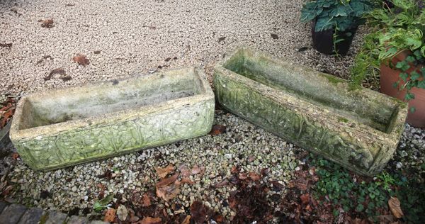 A PAIR OF RECONSTITUTED STONE RECTANGULAR PLANTERS