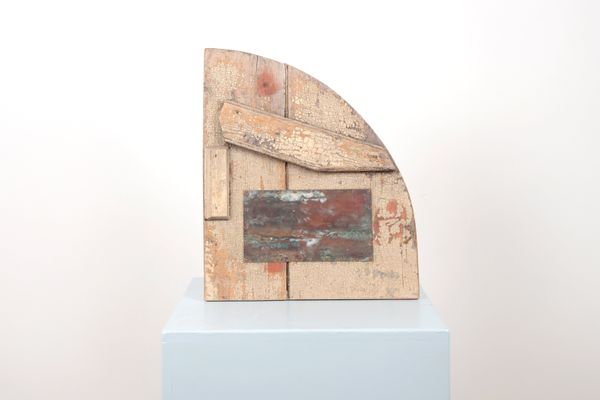 MARTIN SCOREY (1961-2021): A PATINATED METAL PLAQUE MOUNTDED ON A SALVAGED SHUTTER