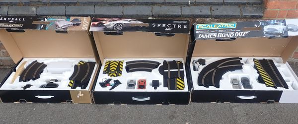 THREE 'JAMES BOND' SCALEXTRIC SETS