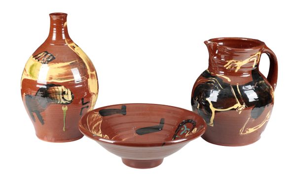 *PETER EUGENE BALL (B.1943), STUDIO CERAMICS A set of three brown-ground figurative ceramics