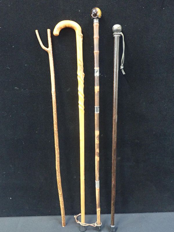 A SILVER-MOUNTED WALKING CANE WITH TIGER'S EYE KNOB