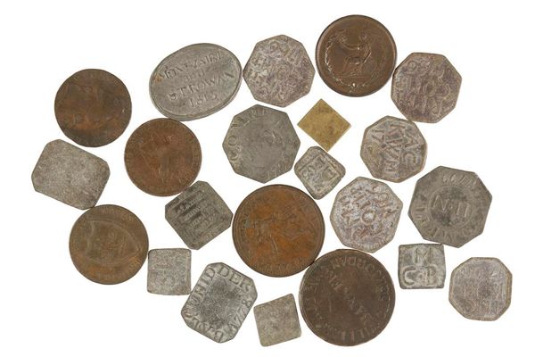 A COLLECTION OF CHURCH PEWTER TOKENS