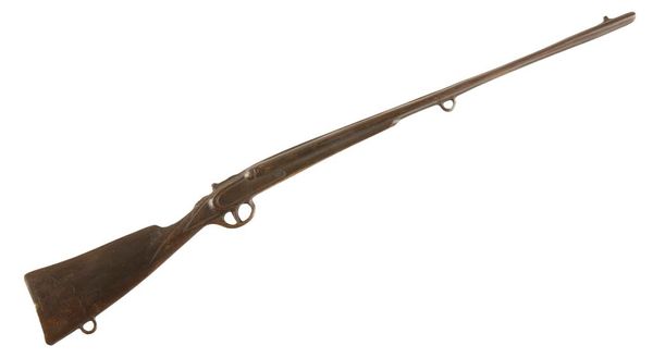 A MINIATURE BRONZE MODEL OF A SIDE BY SIDE SHOT GUN